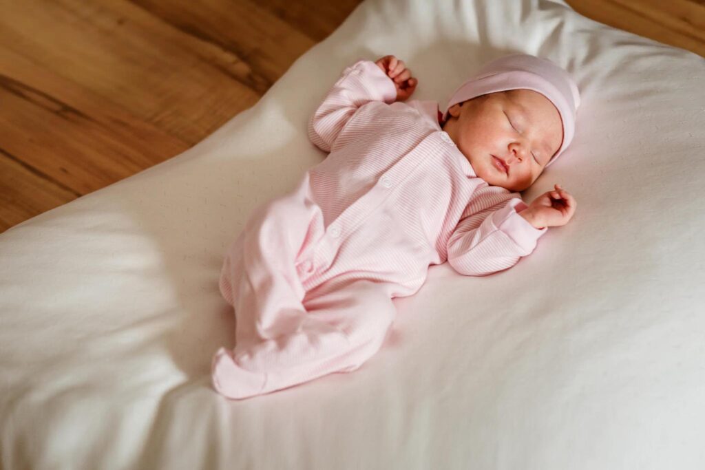 https://www.istockphoto.com/photo/cute-little-newborn-baby-girl-of-one-week-sleeps-sweetly-on-white-blanket-in-natural-gm1340646600-420652456?searchscope=image%2Cfilm